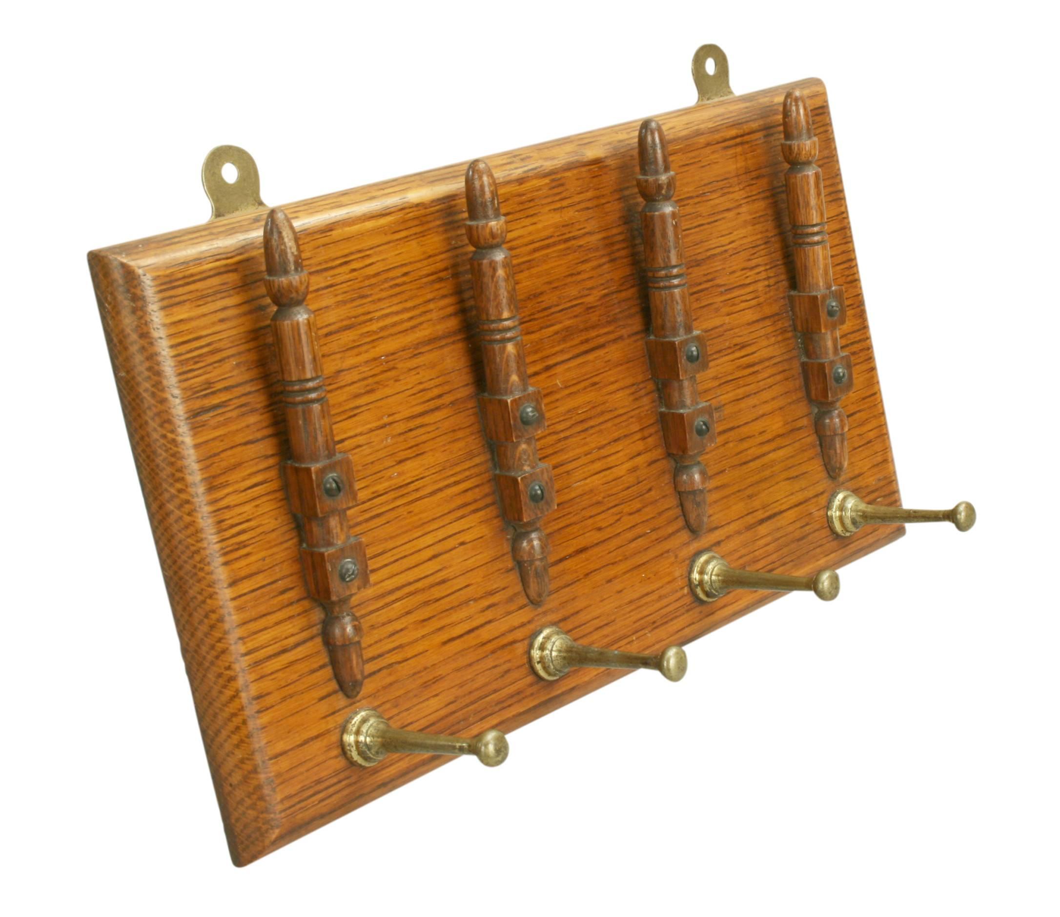 Army and Navy coaching whips rack for four whips. This is a very good quality rack, made from oak with brass hooks. The back is stamped, A & N. CSL Makers and the number 2095.
All in very good original condition with the brass hooks still