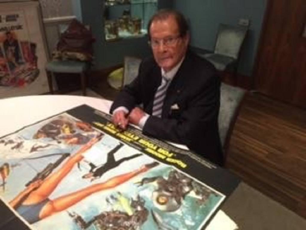 American Live And Let Die signed by Roger Moore For Sale