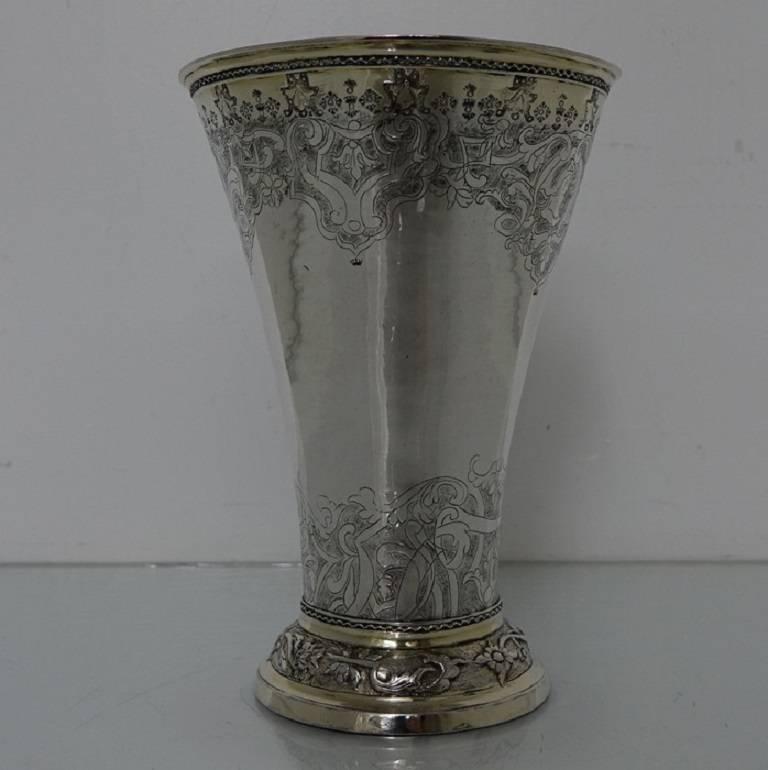 A very elegant and extremely stylish large tapered Swedish partial-gilt beaker with beautiful engraving on the upper and lower part of the body for decorative high/lowlights, with the central body plain formed for contrasting overall effect. The
