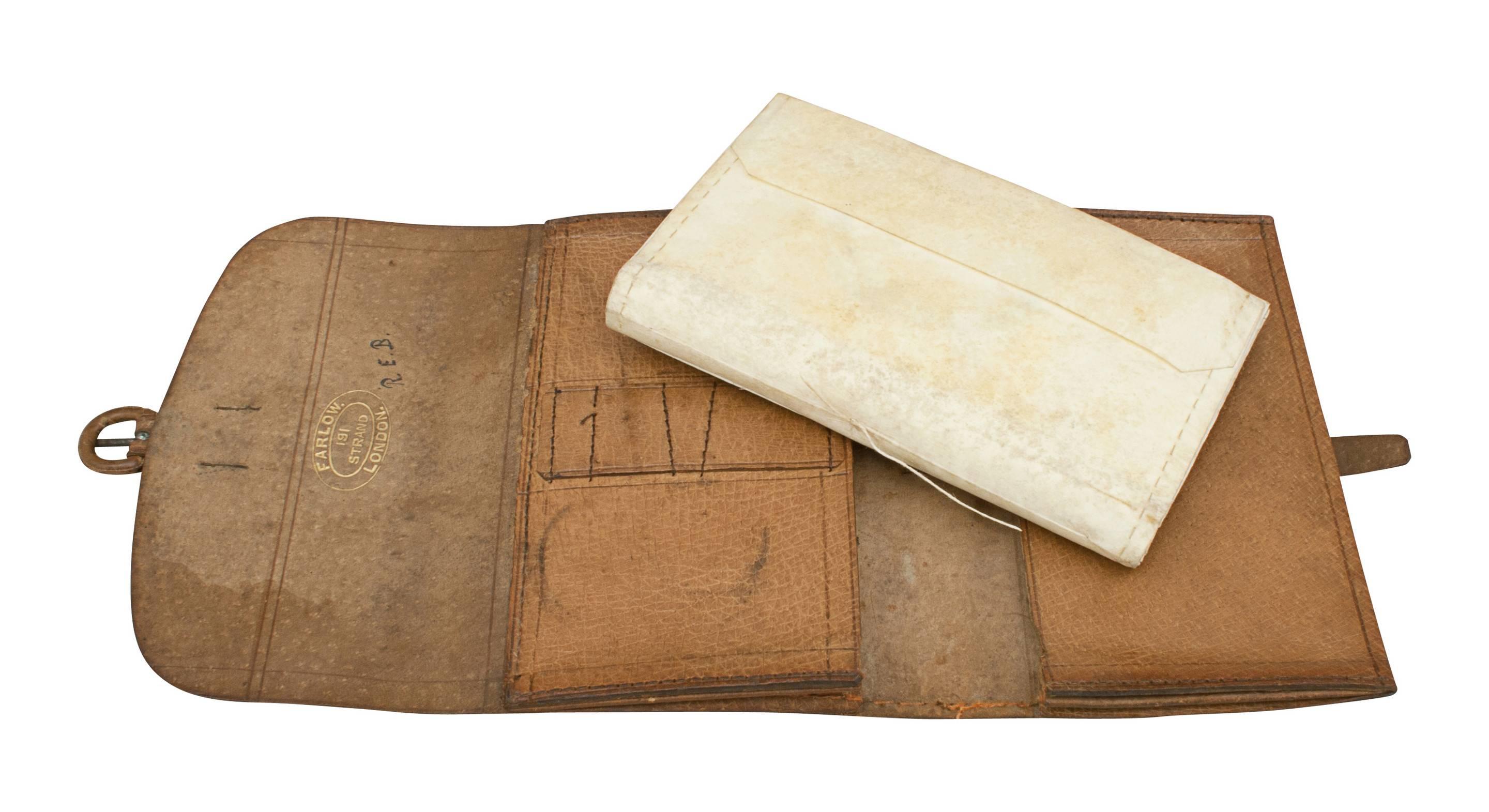 Farlow leather trout fly wallet.
A fine pigskin leather fishing fly and cast wallet with embossed tram line decoration by Farlow. The tan leather is in original condition as is the original strap and buckle, the front and rear of the wallet