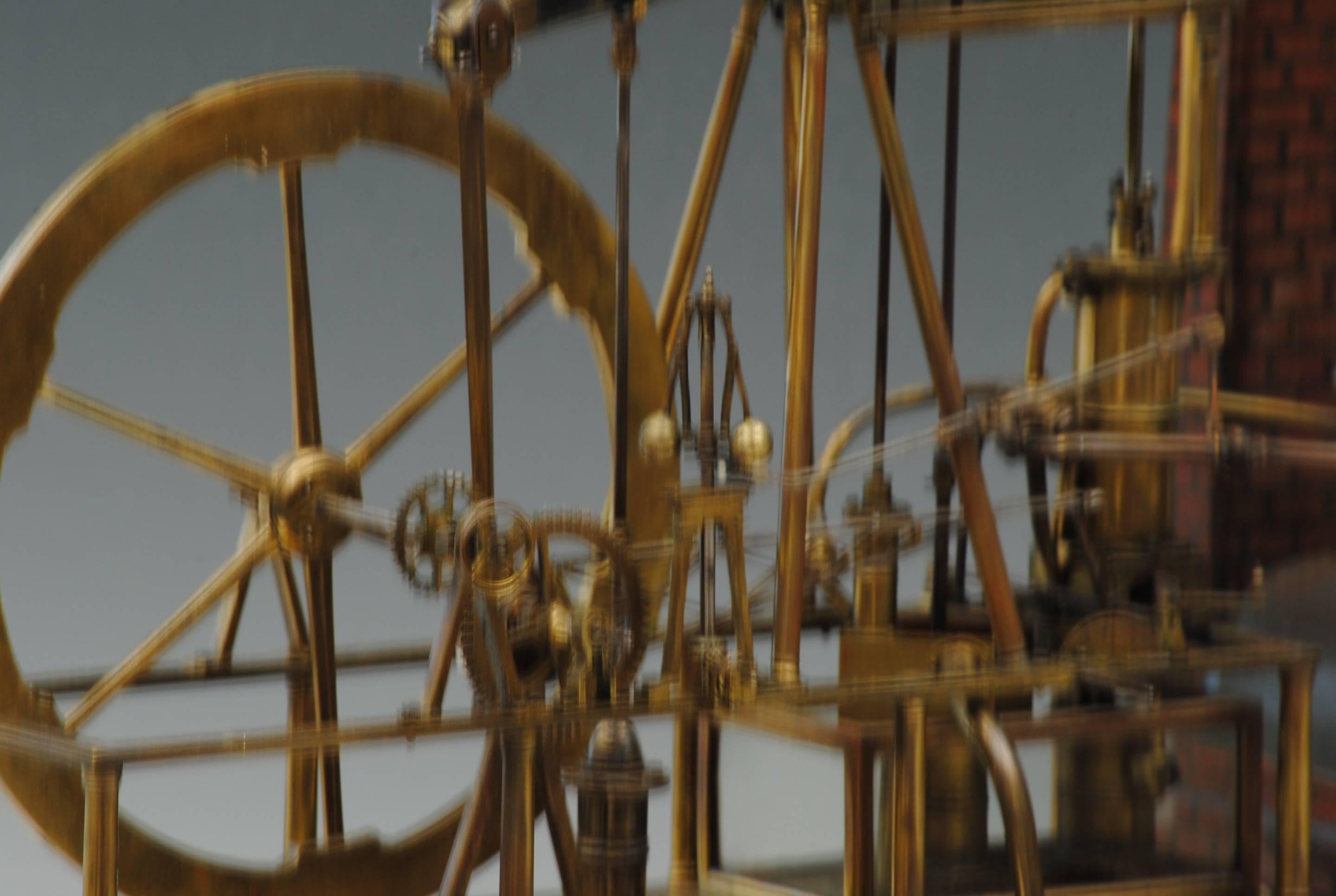 A superbly engineered model of a Watt steam engine by Serles who must have been a watch maker to have made such a fine model.