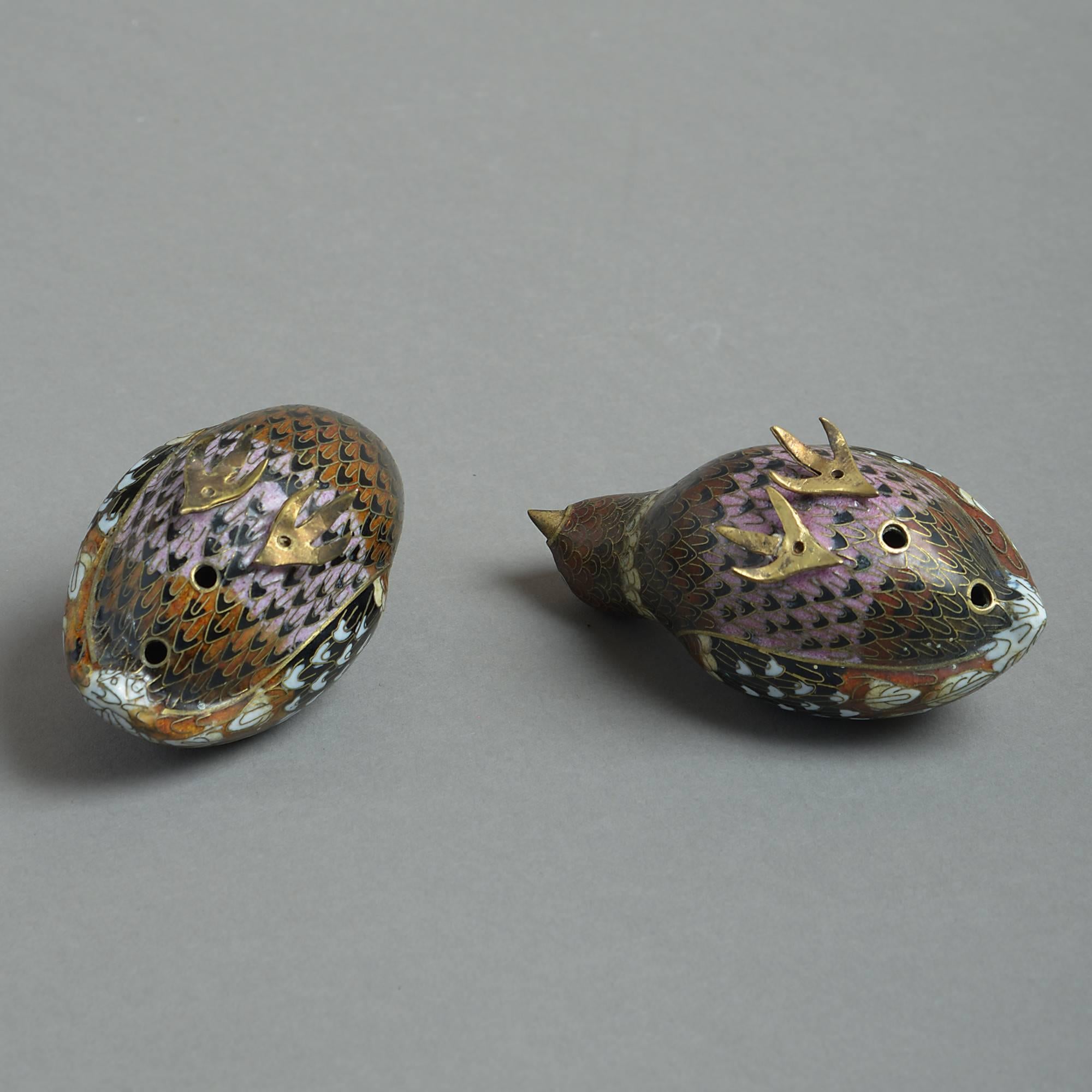 A pair of early 20th century cloisonné quail, the bodies with polychrome enameled decoration in brown, black, pink and white, having brass beaks and feet.
Republic period (1912-1949).