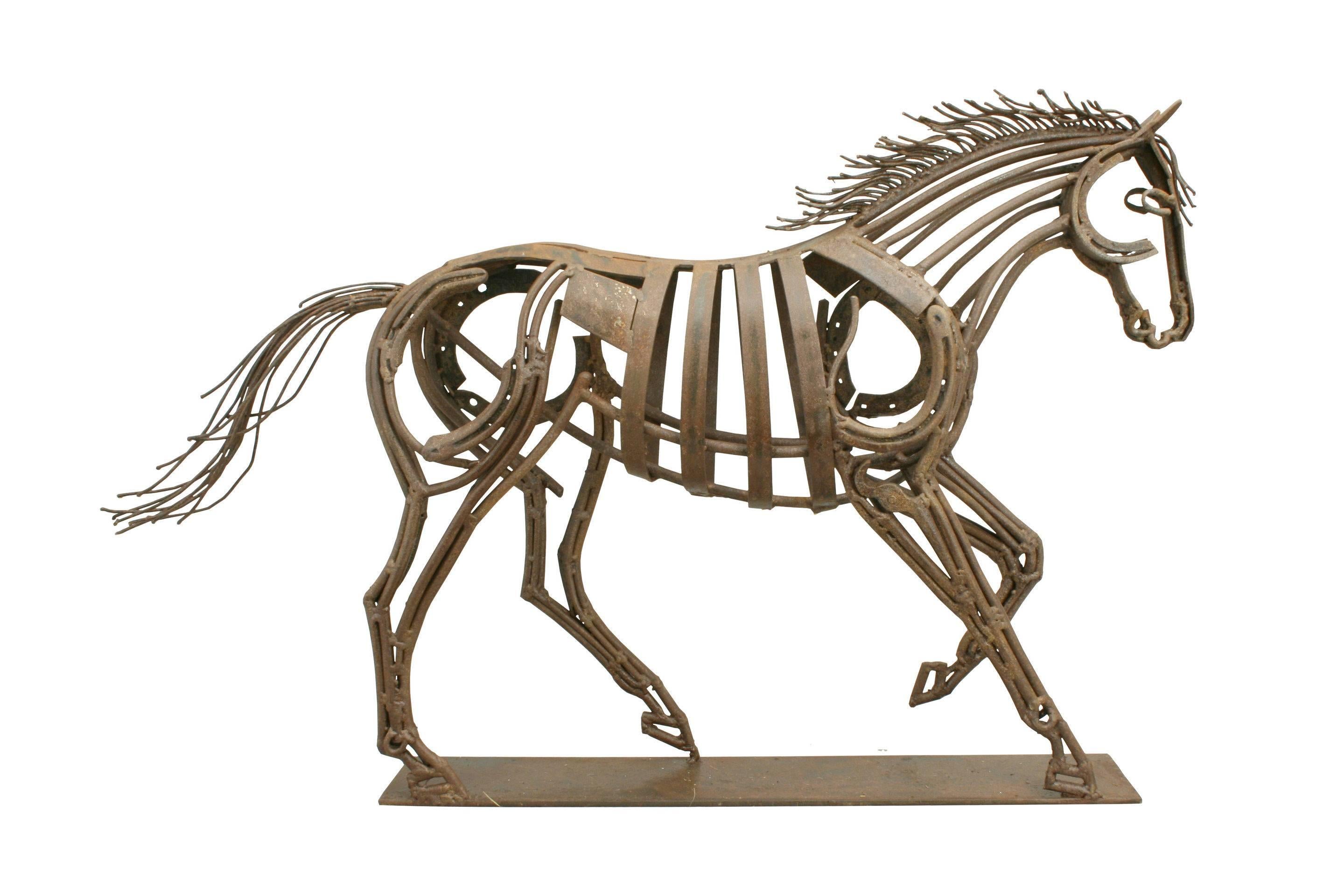 Contemporary metal horse sculpture. 
A wonderful metal sculpture by Sophie Thompson. Her creation is of a trotting horse, the movement of the mane has been expertly captured and has been fabricated from recycled metal. 

Sophie Thompson graduated