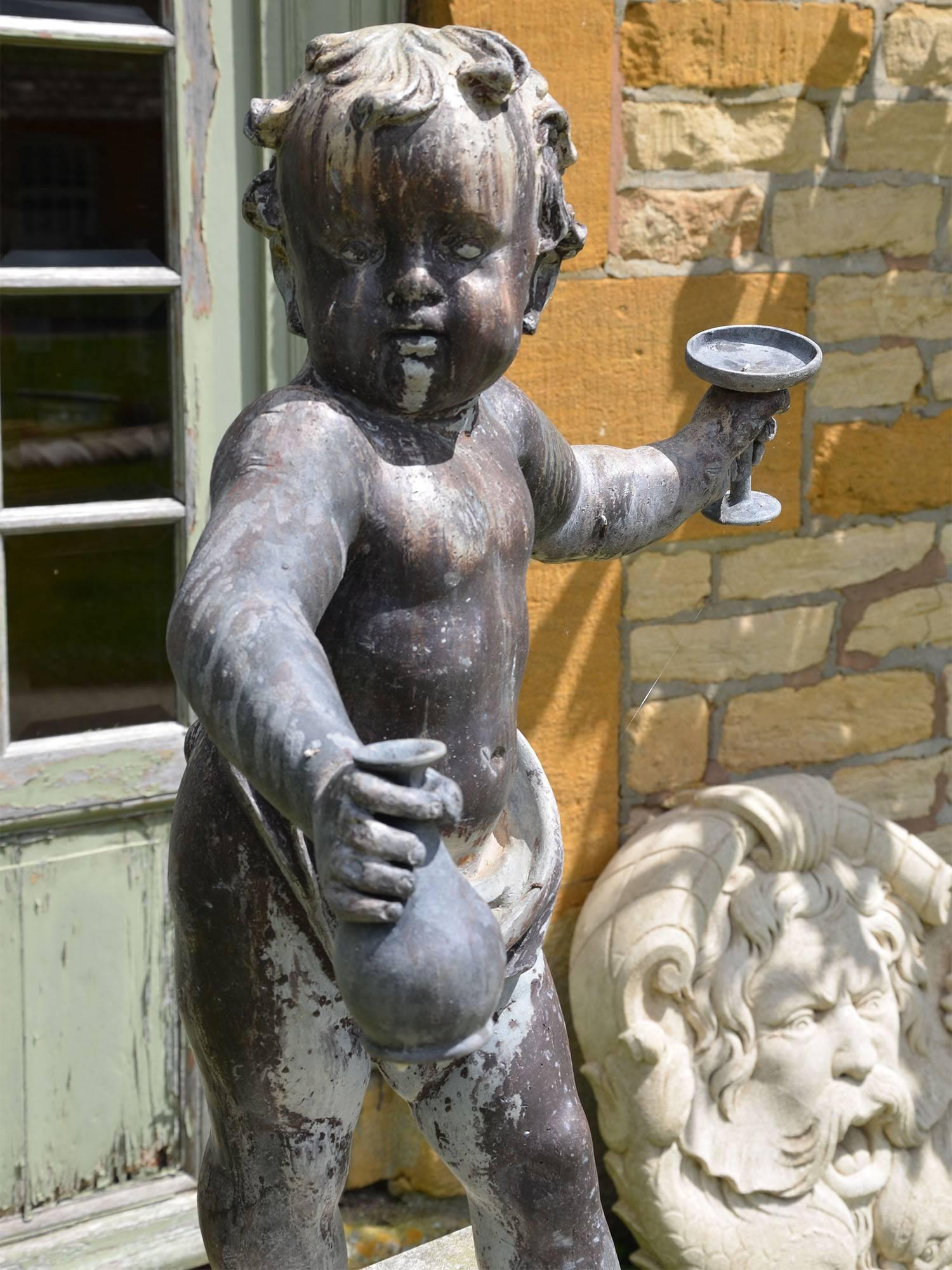 Late 17th Century 17th Century Lowland Lead Putto For Sale
