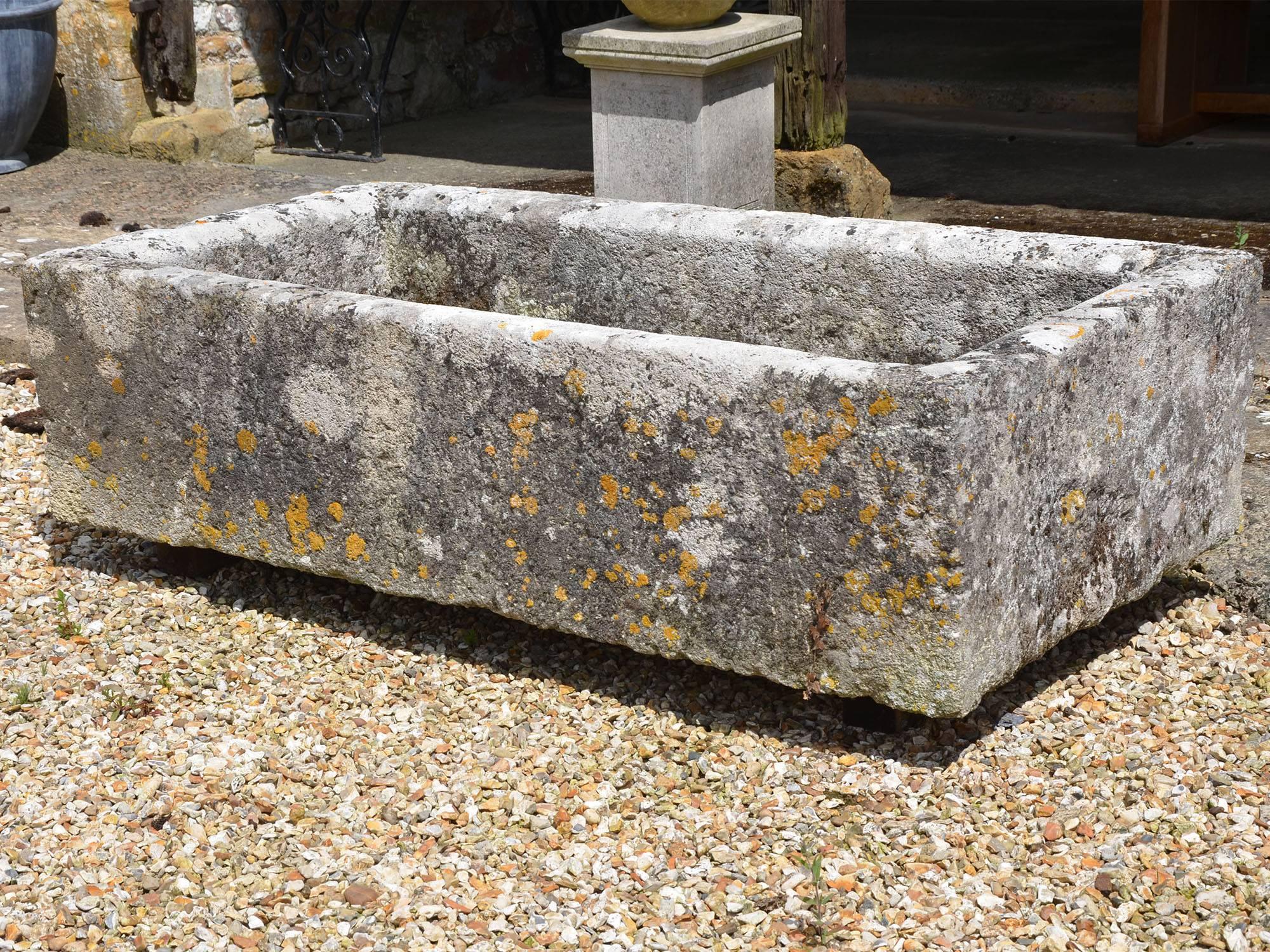 A large 18th century rectangular stone trough

With good weathering and patination.