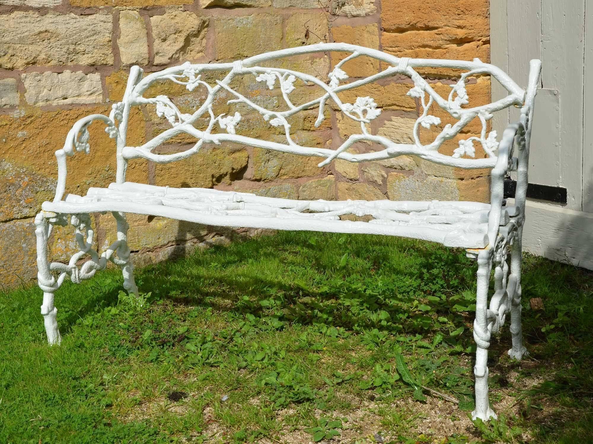 English Two 19th Century Cast Iron Garden Seats of a Twig and Foliage Design