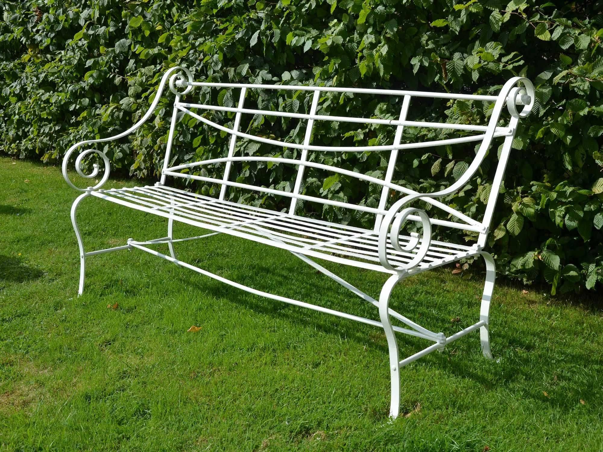 English Wrought Iron Strap Work Garden Seat Having Cabriole Legs and Scroll Arms For Sale