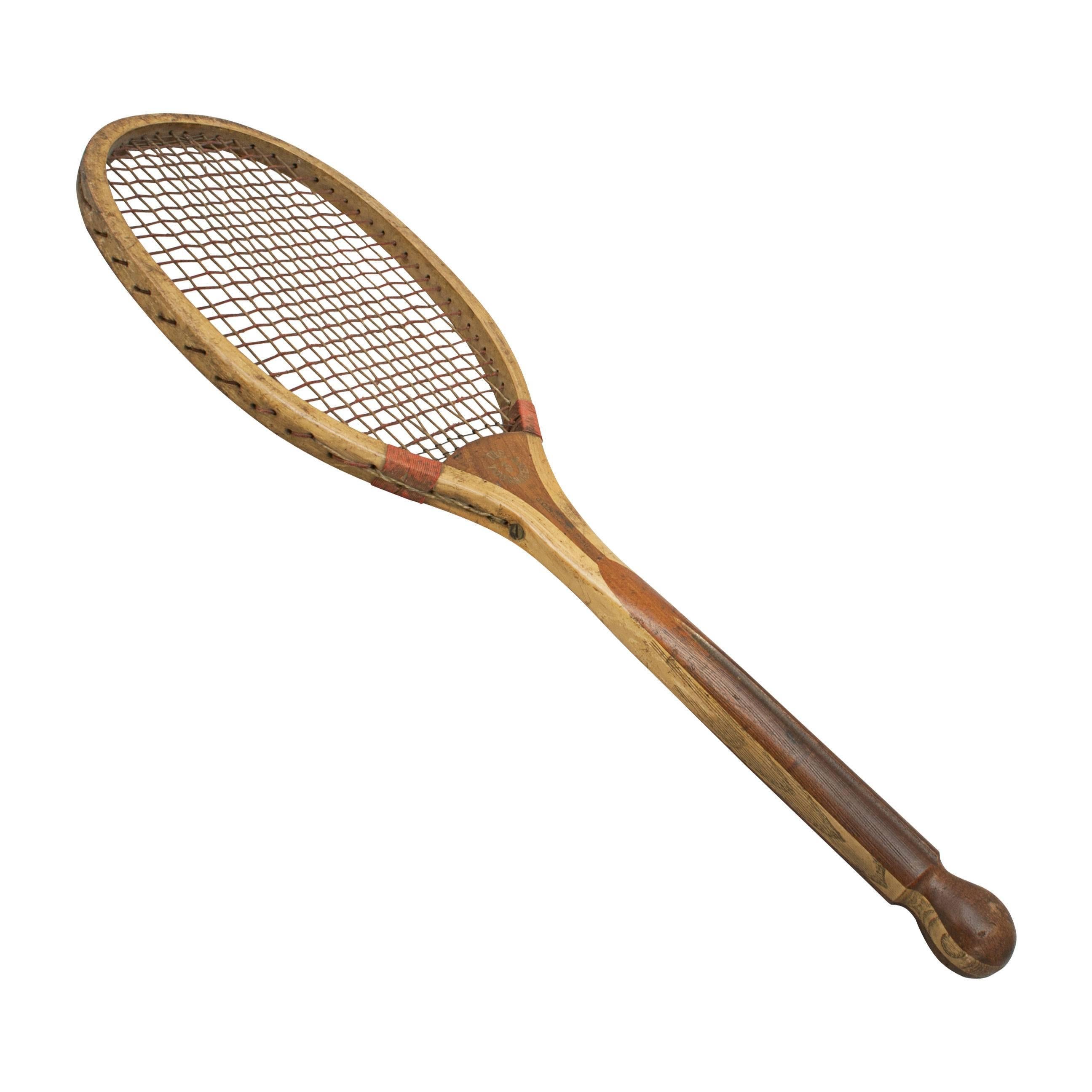 Ball tail tennis racket, George Gibson Bussey
A fine and rare example of a ball tail lawn tennis racket by Bussey 'The Tournament 3'. A nice 'Light' ash framed racket with convex wedge. The wedge is embossed in gilt 'The Tournament ' with the