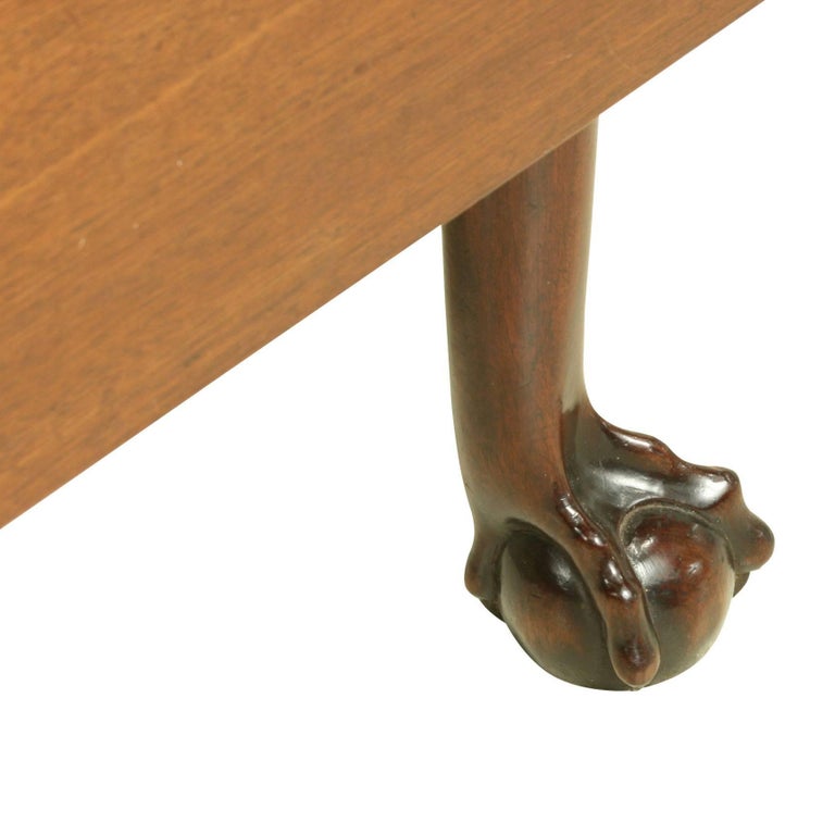 Antique George III walnut drop leaf-table.
A rectangular walnut drop-leaf table on tapered legs ending in well carved ball and claw feet. Each leaf measures: 18 ¾' deep and when both are open the full size of the top is 52 ½' x 38 ½'. A good