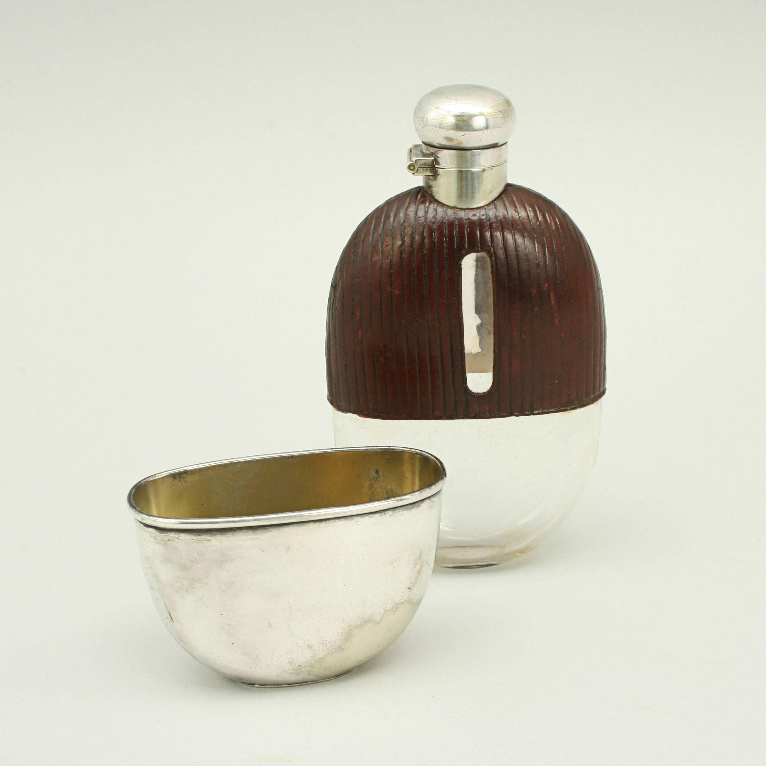 glass flask with leather cover