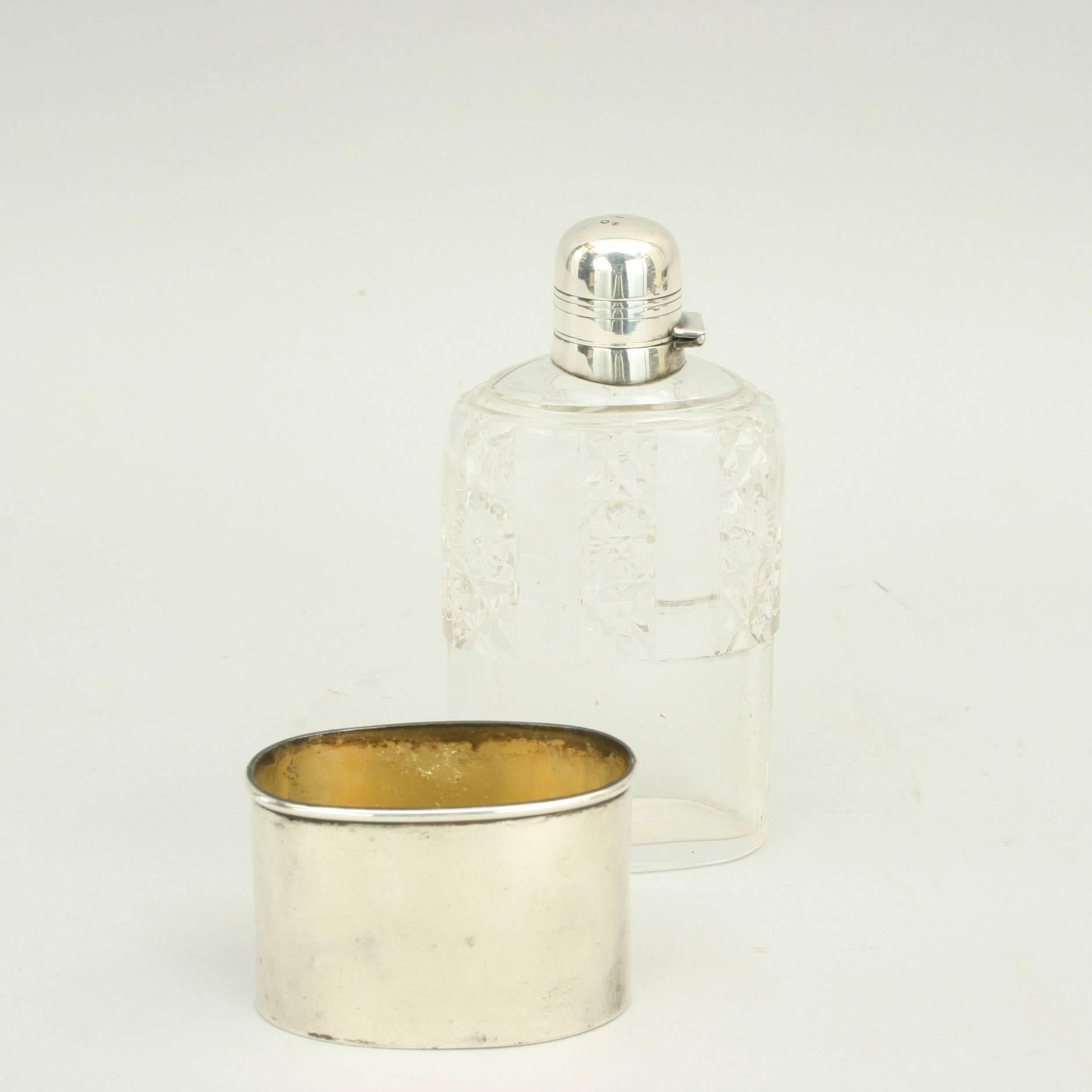 Silver and glass hip flask.
A very nice Victorian silver and cut glass hip flask hallmarked London 1889, makers initials T.W, the silver cup with gilded interior.
