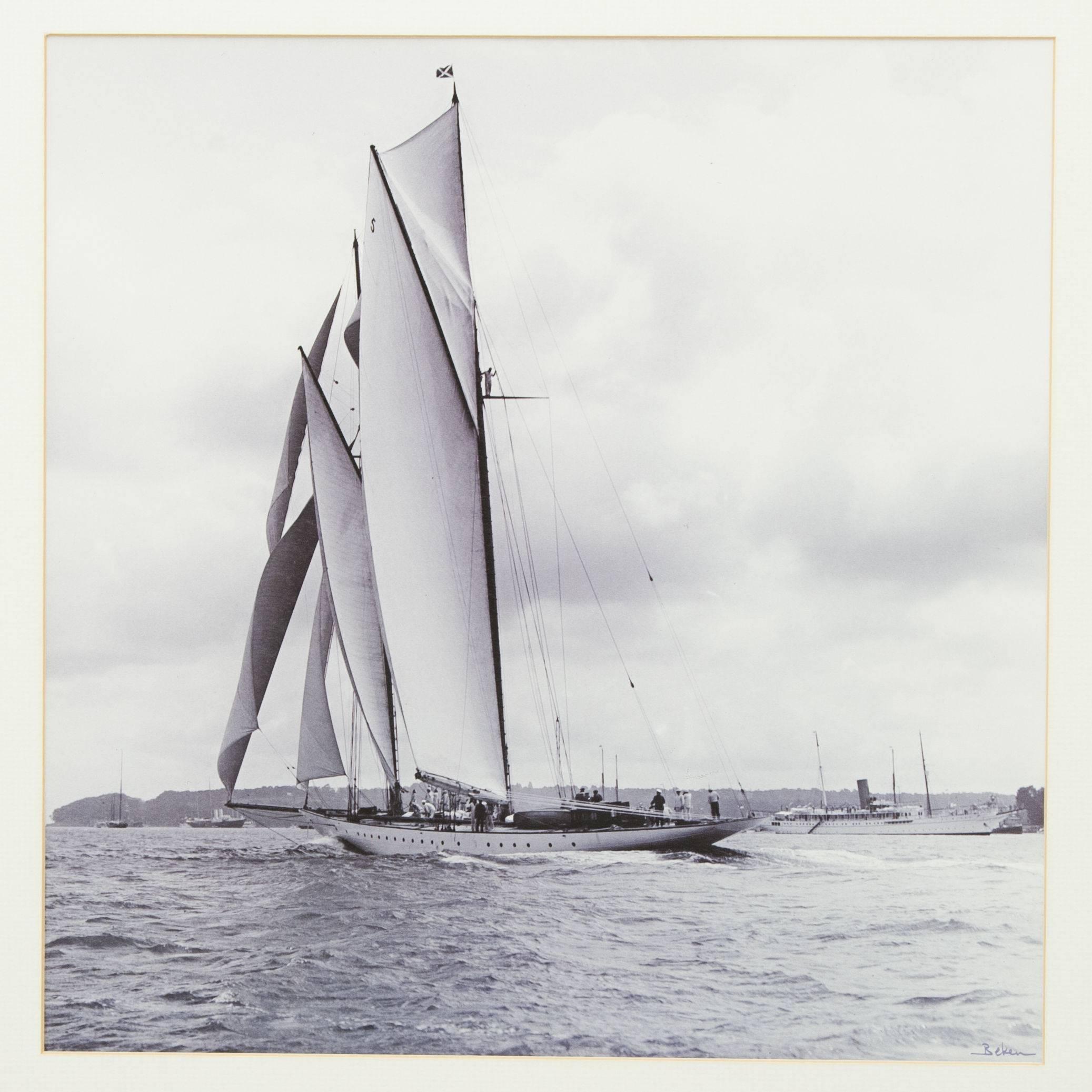 Yachting photograph Westward by Beken of Cowes. 
Framed black and white yachting photographic print titled 'Westward, 1920 with a printed 'Beken' signature in the bottom right hand corner. The title is hidden under the mount, the image printed on