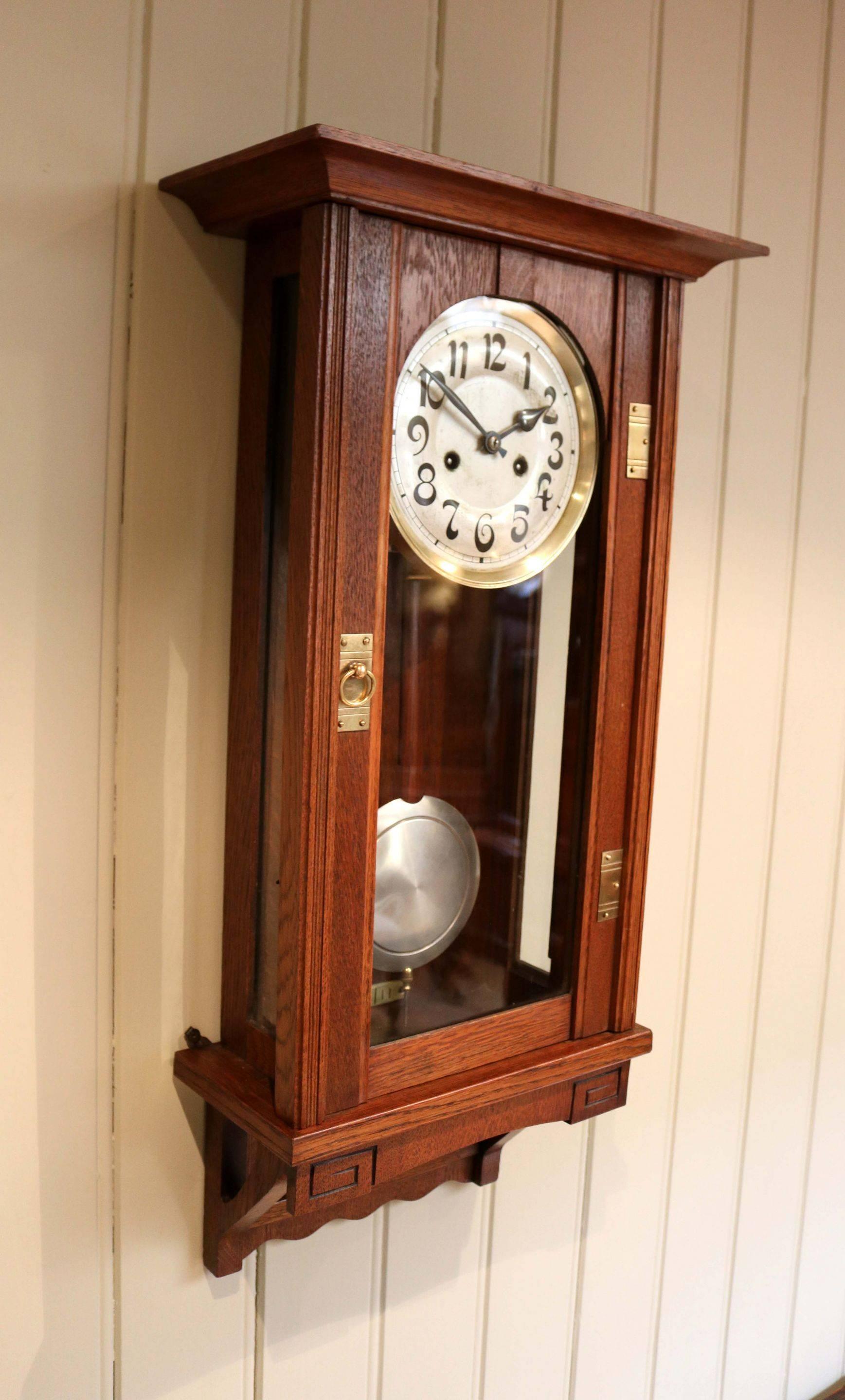German Oak Arts & Crafts Striking Wall Clock For Sale