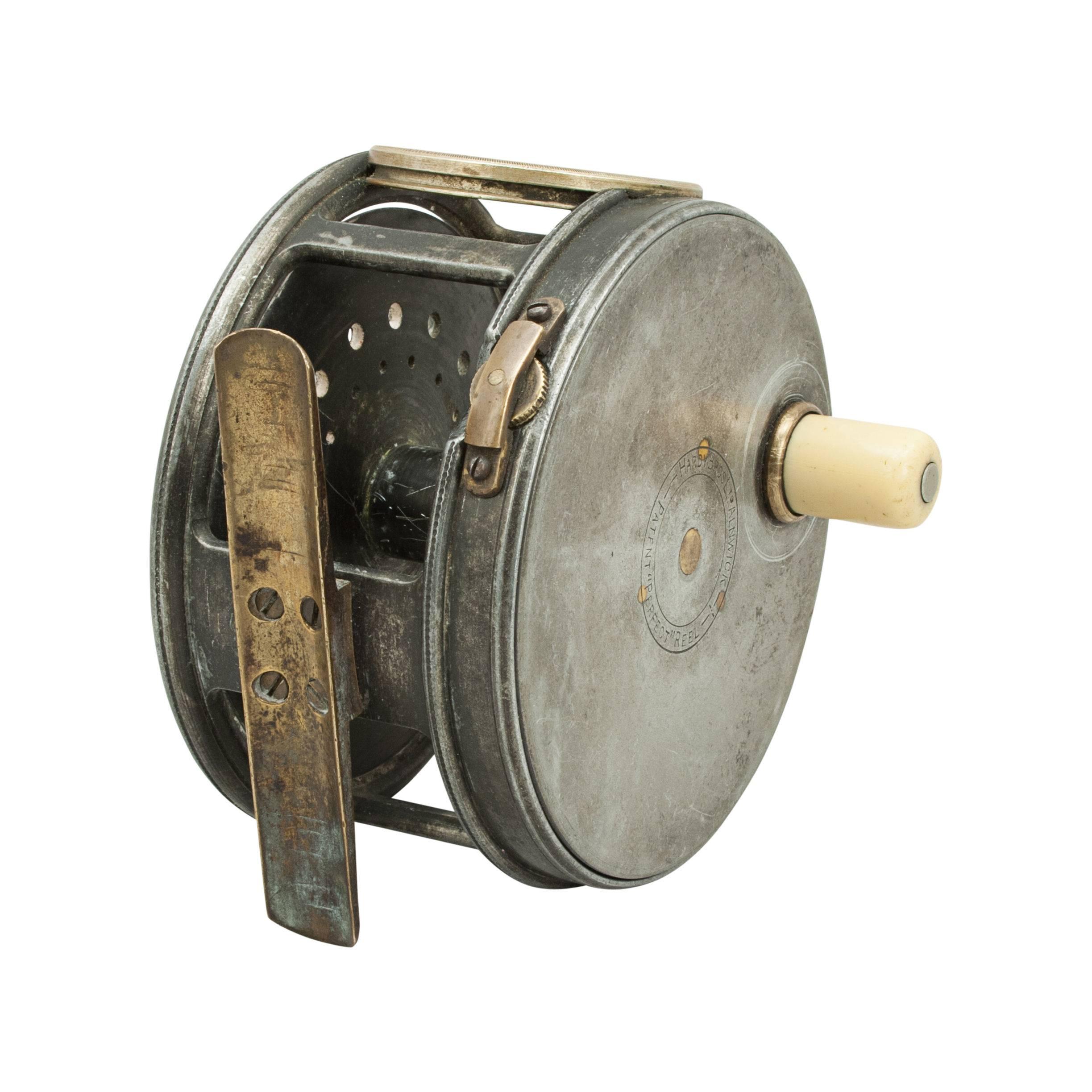 Hardy Perfect Salmon Fishing Reel, 1912 

This Hardy Perfect salmon reel is with smooth brass foot, rim tension screw and agate line guard. 
A good Hardy Perfect Salmon reel with ivory handle, smooth brass foot, rim tension screw, brass line