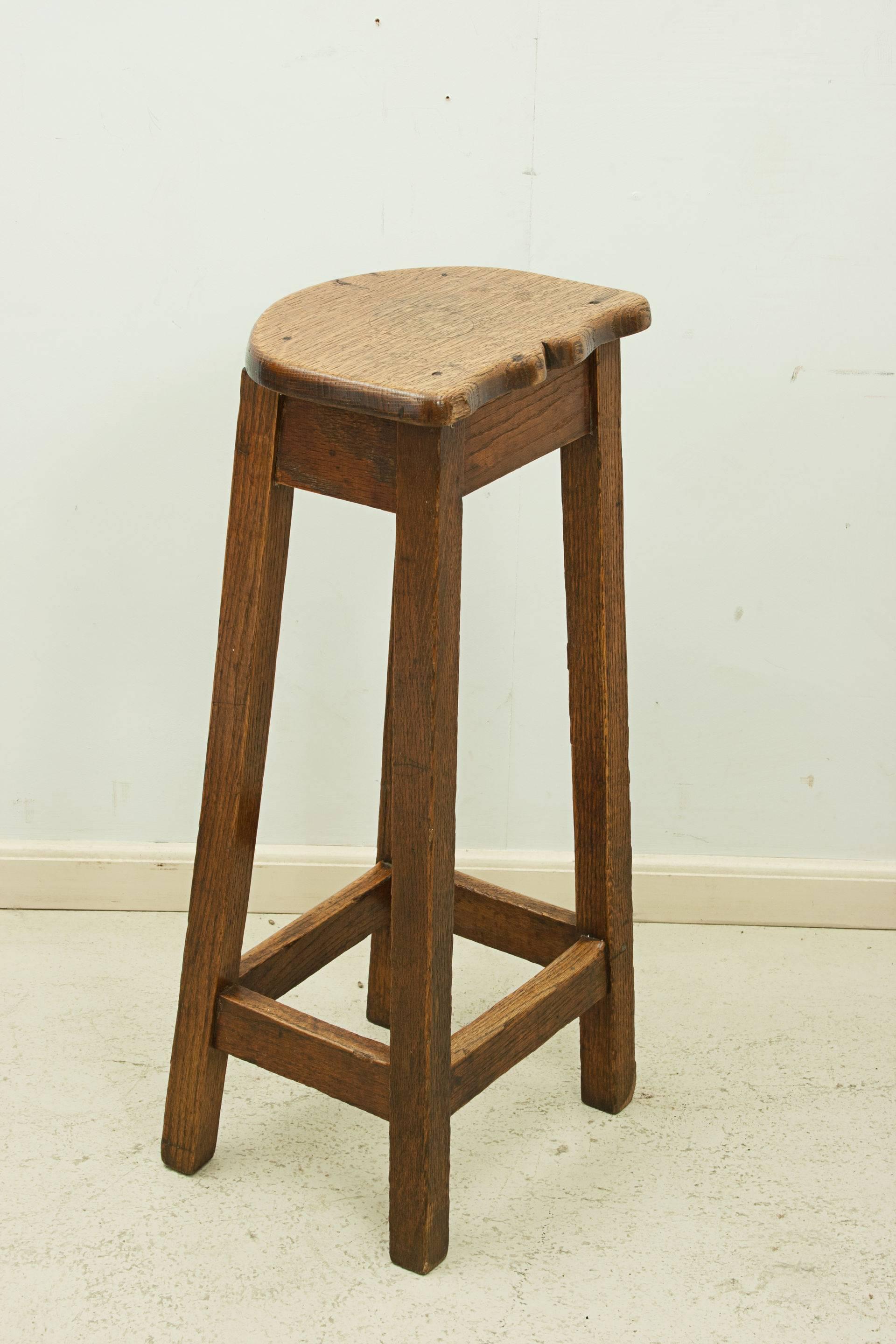 Oak bar stool.
A strong and compact oak bar stool with a shaped seat. This type of stool is great for use as a kitchen stool in a breakfast bar eating area. Also ideal for use in a bar or cafe.