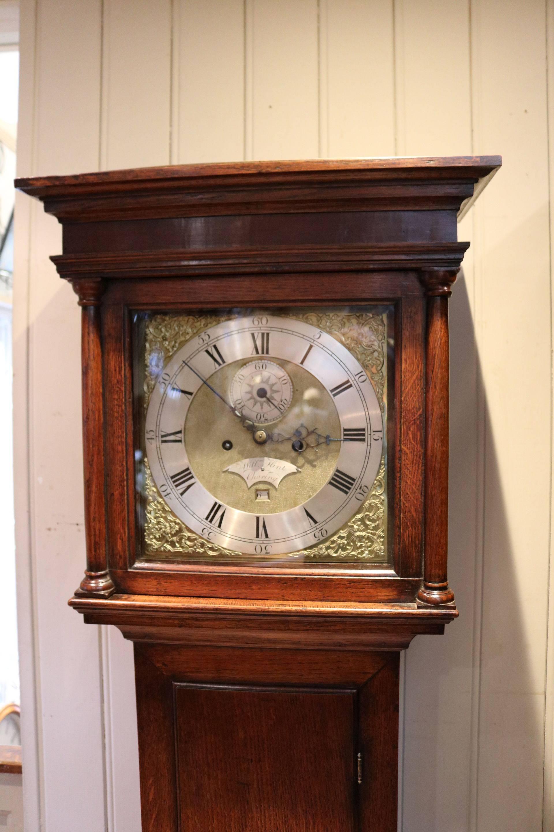 A small, very original solid oak longcase clock from Kent having great color and proportions. This clock is unusual as it is of small proportions, yet the clock is of 8 day duration (most clocks this size are 30 hour). It has a flat top, a square