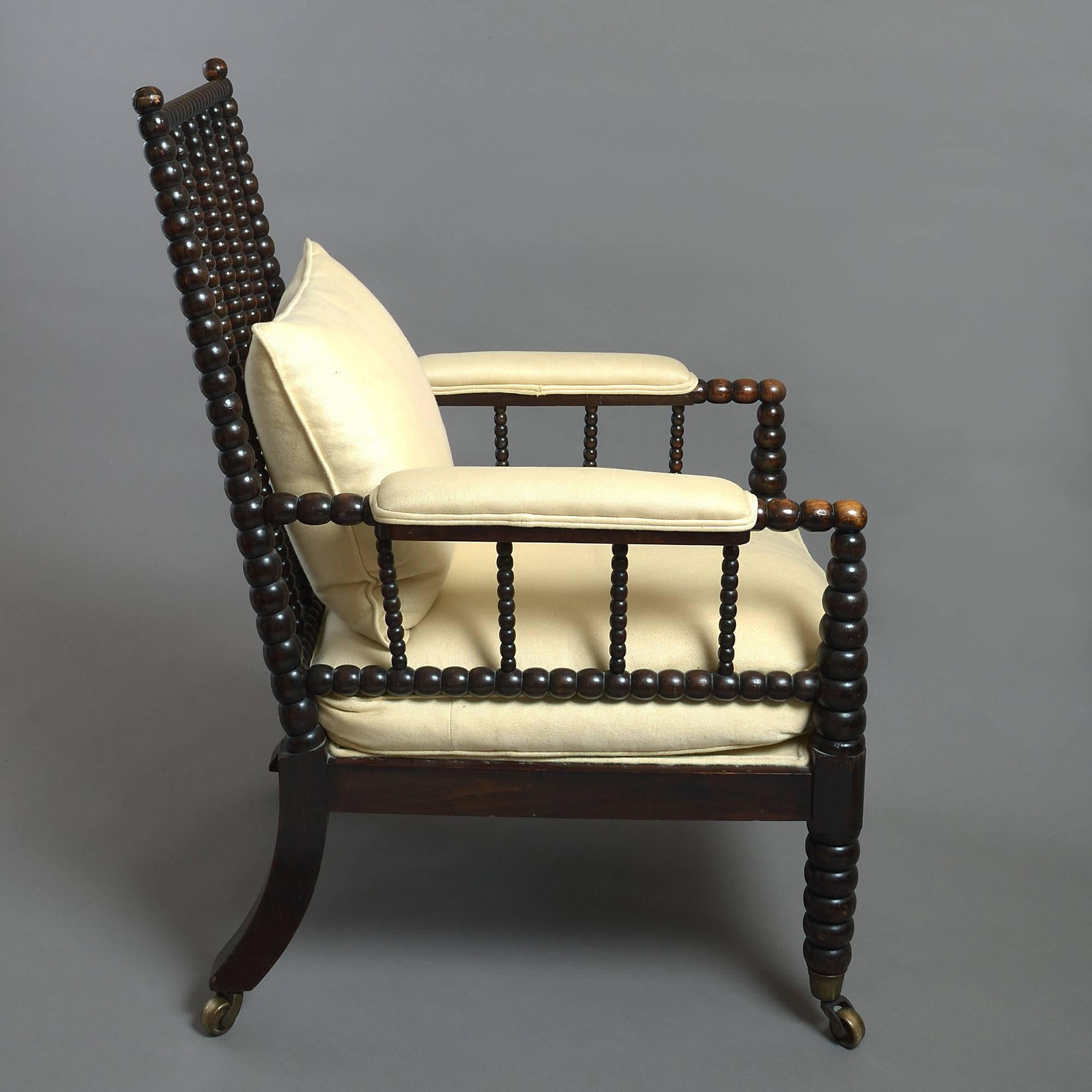 English 19th Century Bobbin Turned Ebonized Spindle Armchair