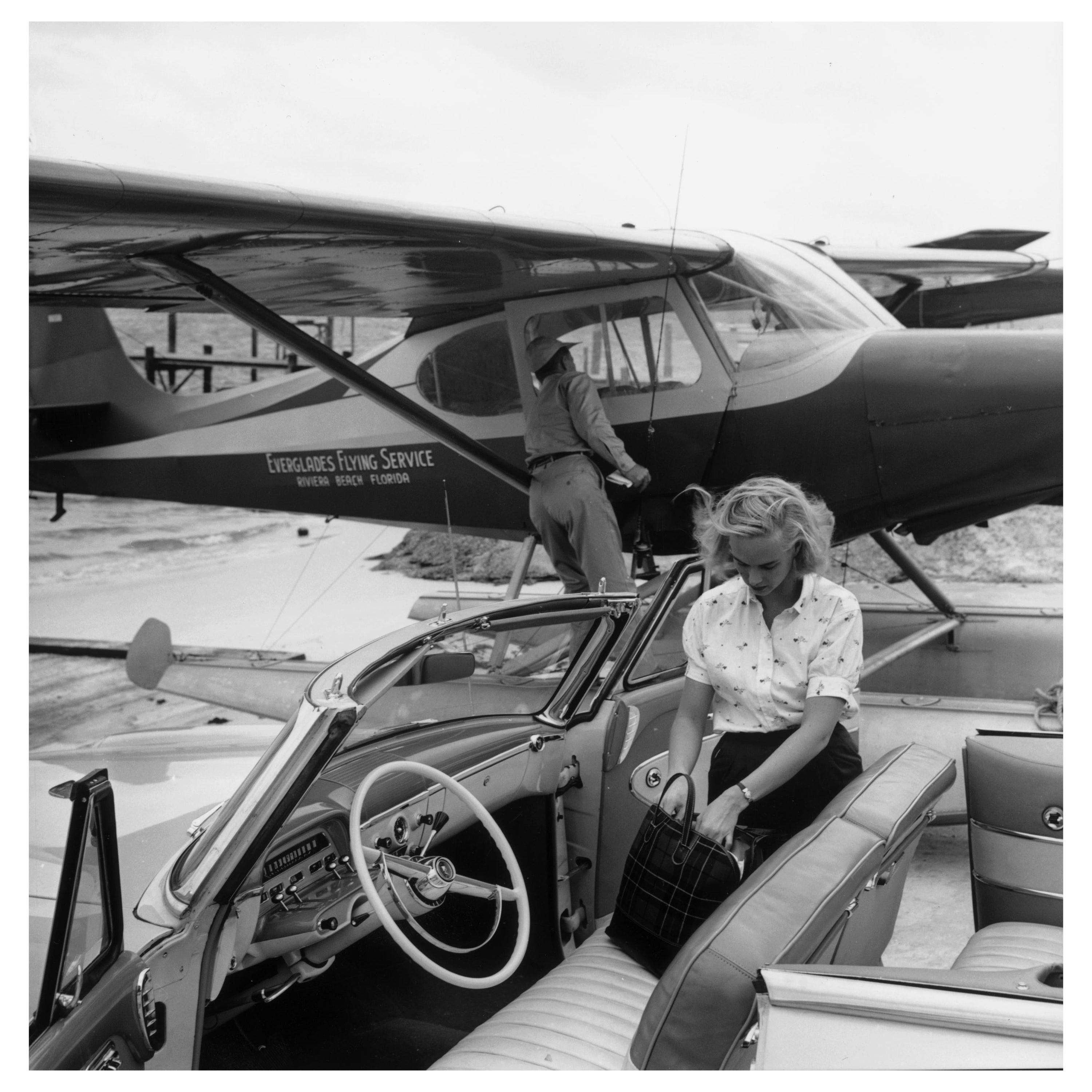 Slim Aarons Black and White Photograph – Privater Transport