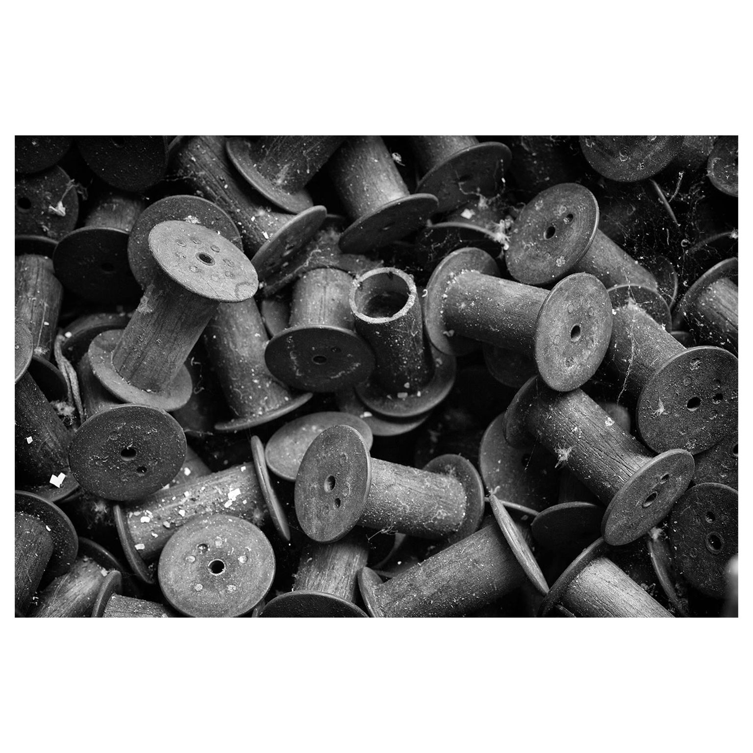 Rebecca Skinner Still-Life Photograph - "Spools #2", black and white, abandoned, silk mill, industrial, photograph