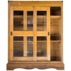 Oak Cabinet with Glass Sliding Doors