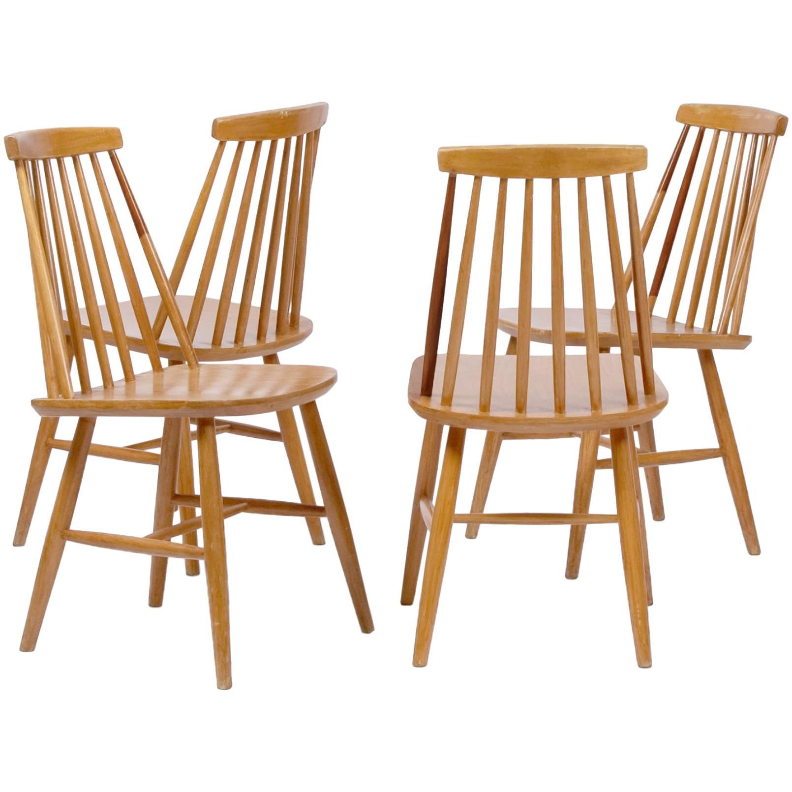 Set of Four Midcentury Spindle Back Chairs For Sale