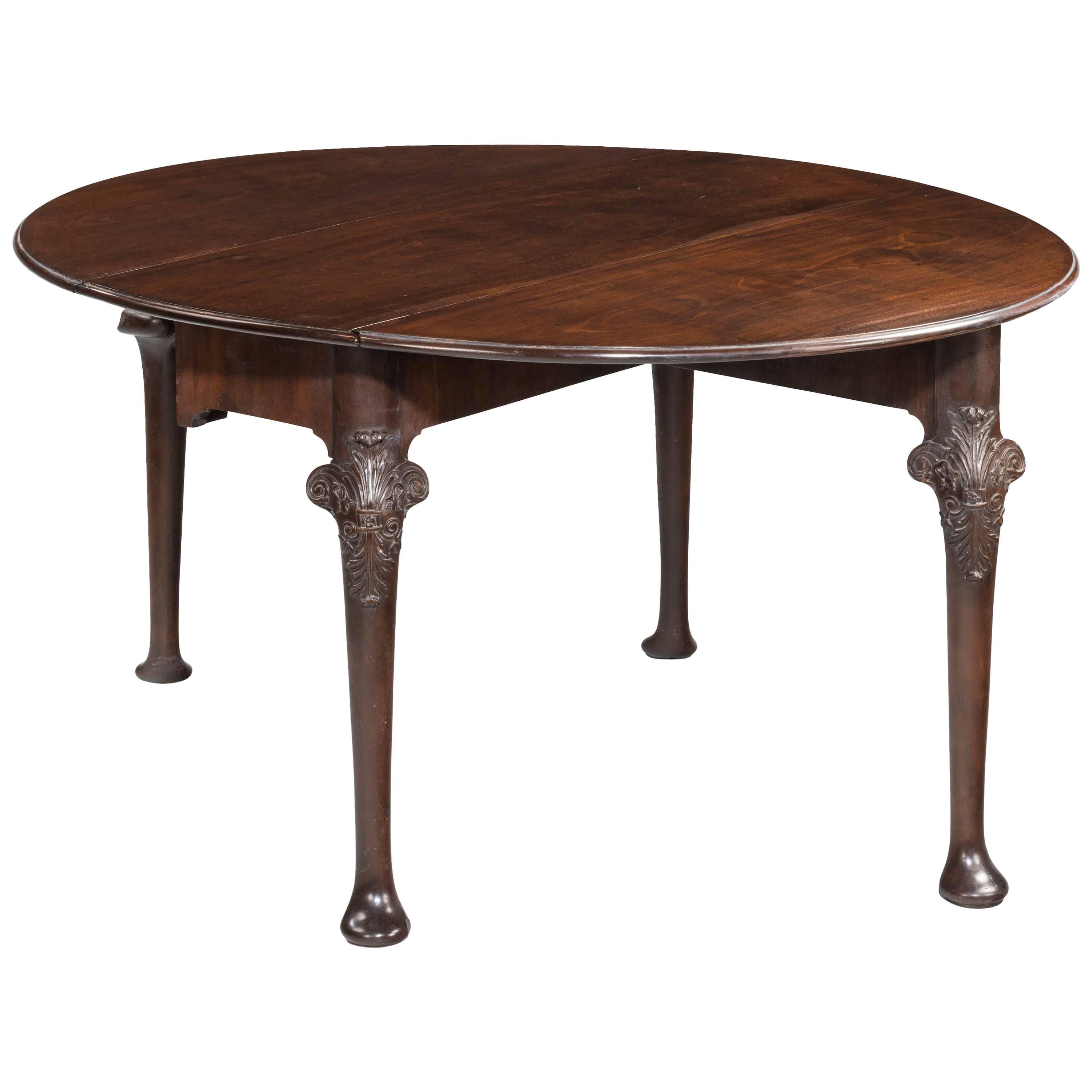 Mid-18th Century Mahogany Oval Drop Leaf Table with Beautifully Carved Knees For Sale