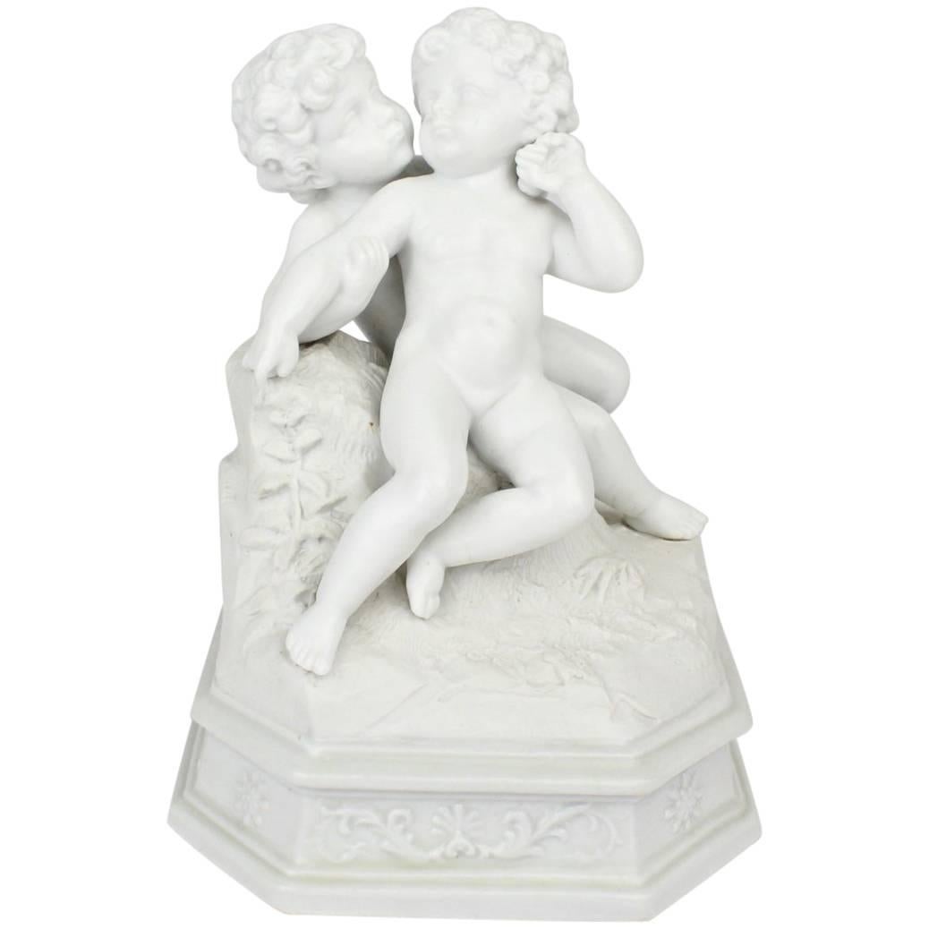 Antique 19th Century French Bisque Figurine of Two Putti in an Amorous Embrace