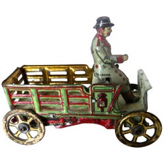 Tin Penny Toy 'Diminutive' Open Stake Truck with Driver, German, circa 1900