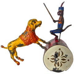 Antique "Monkey on Drum Training a Dog" Tin Toy, circa 1885