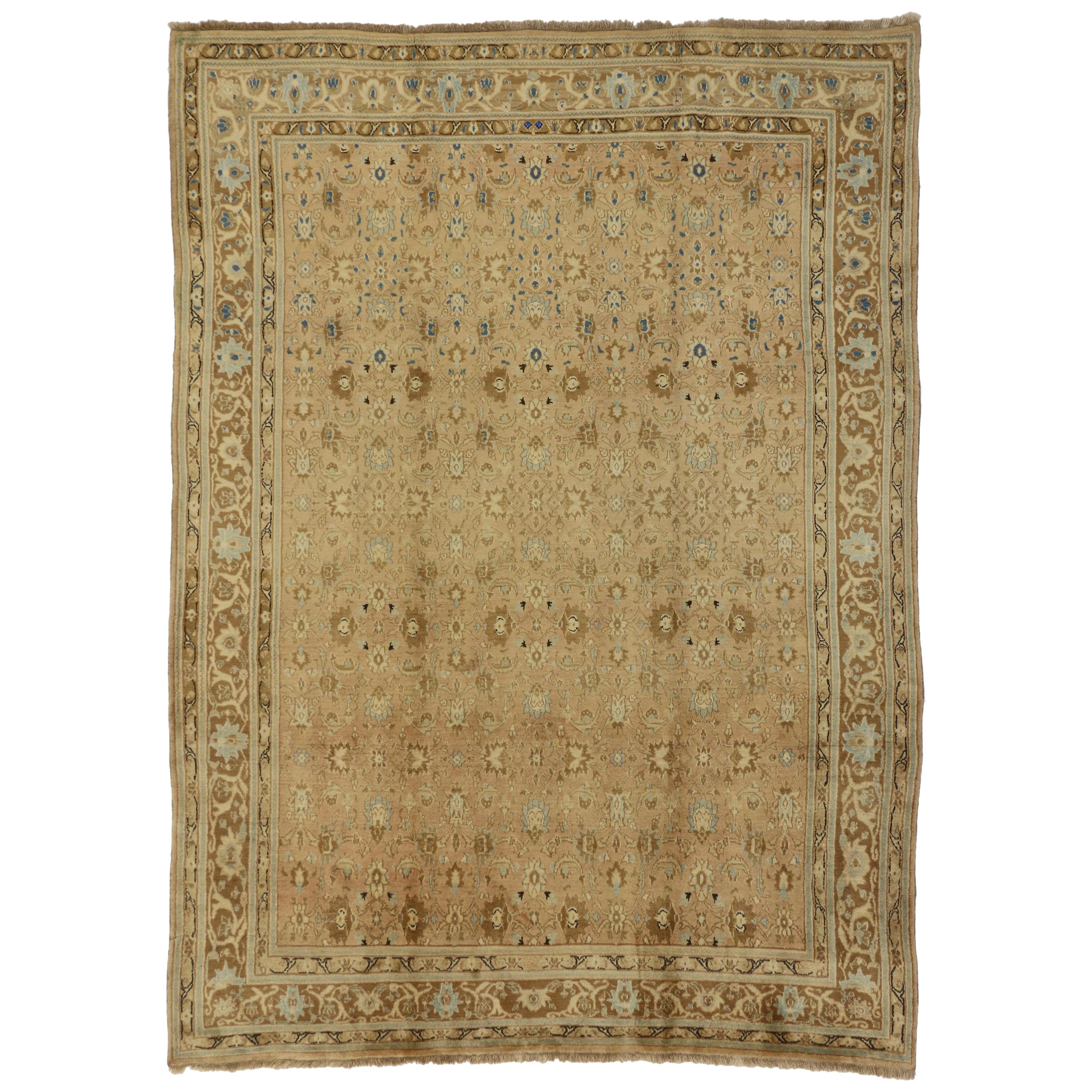 Colonial Revival Style Vintage Persian Mashhad Rug with Warm, Neutral Colors For Sale