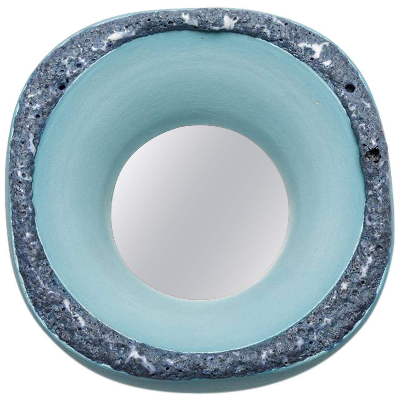 Ceramic Mirror with blue and green glaze decoration by Mia Jensen.