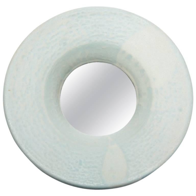 Ceramic Mirror with green glaze decoration by Mia Jensen.