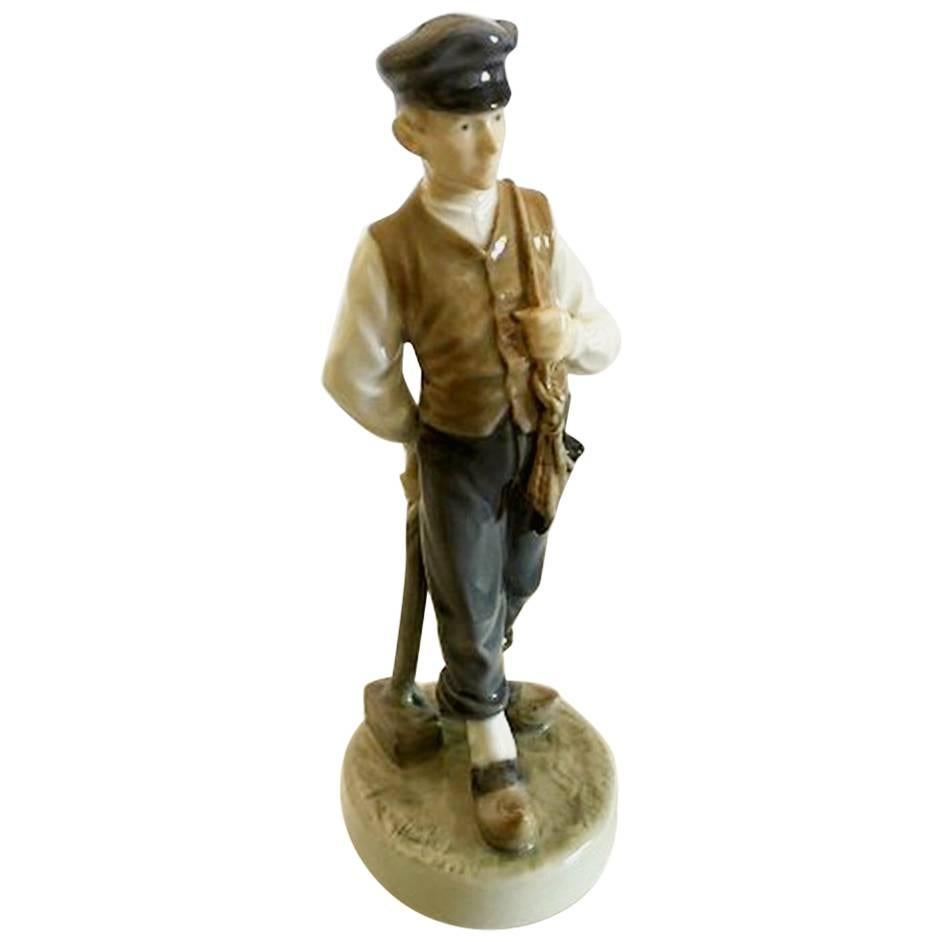 Royal Copenhagen Figurine of Farmer Boy with Hammer No. 620 For Sale
