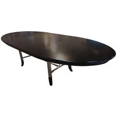 Custom Steel and Ebony Oval Design Dining Table Having Two Hide-Away Leaves