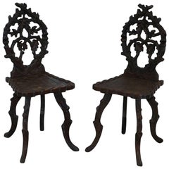 Very Rare Pair of circa 1870 Linden Wood Black Forrest Carved Wood Hall Chairs
