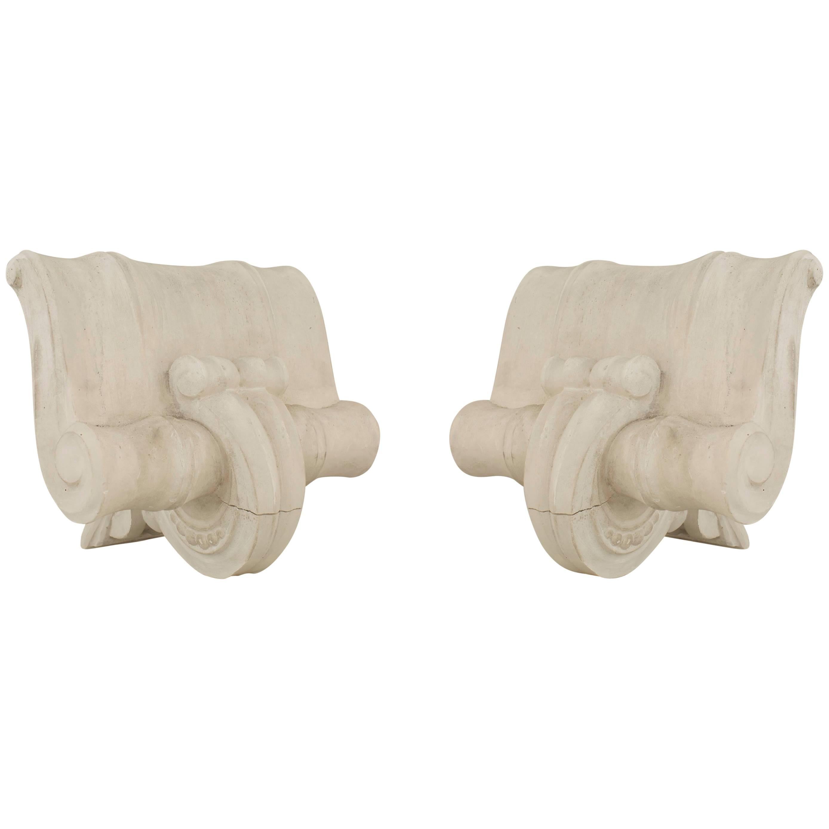 Pair of Mid-Century Neoclassic Plaster Capital Sconces (manner of Serge Roche)