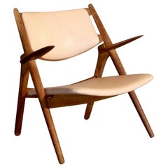 Chaise CH-28 Sawbuck de Hans J. Wegner, années 1950