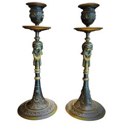 A Pair of Napoleon III French Bronze Candlesticks, circa 1860s