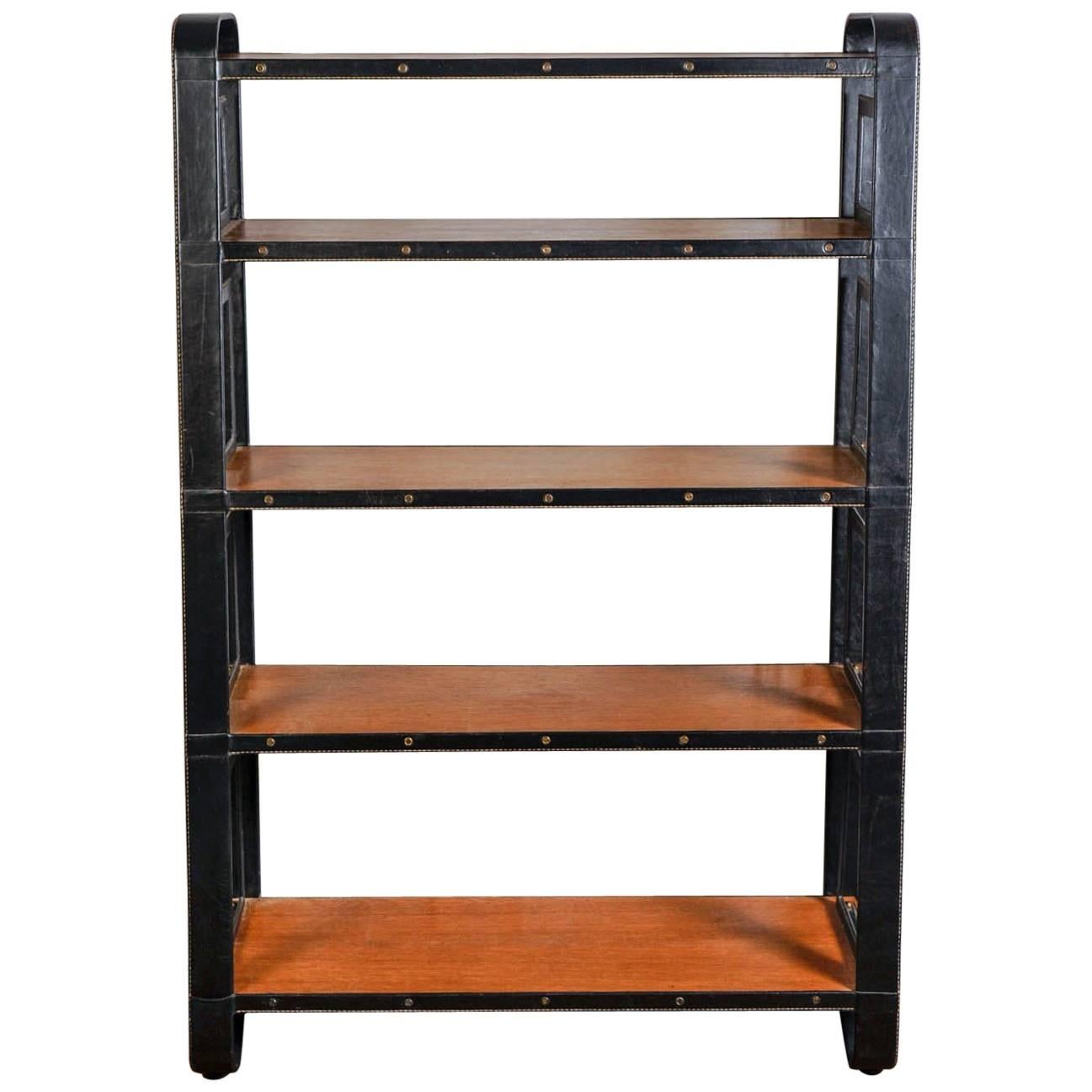 Rare Stitched Leather Bookcase by Jacques Adnet