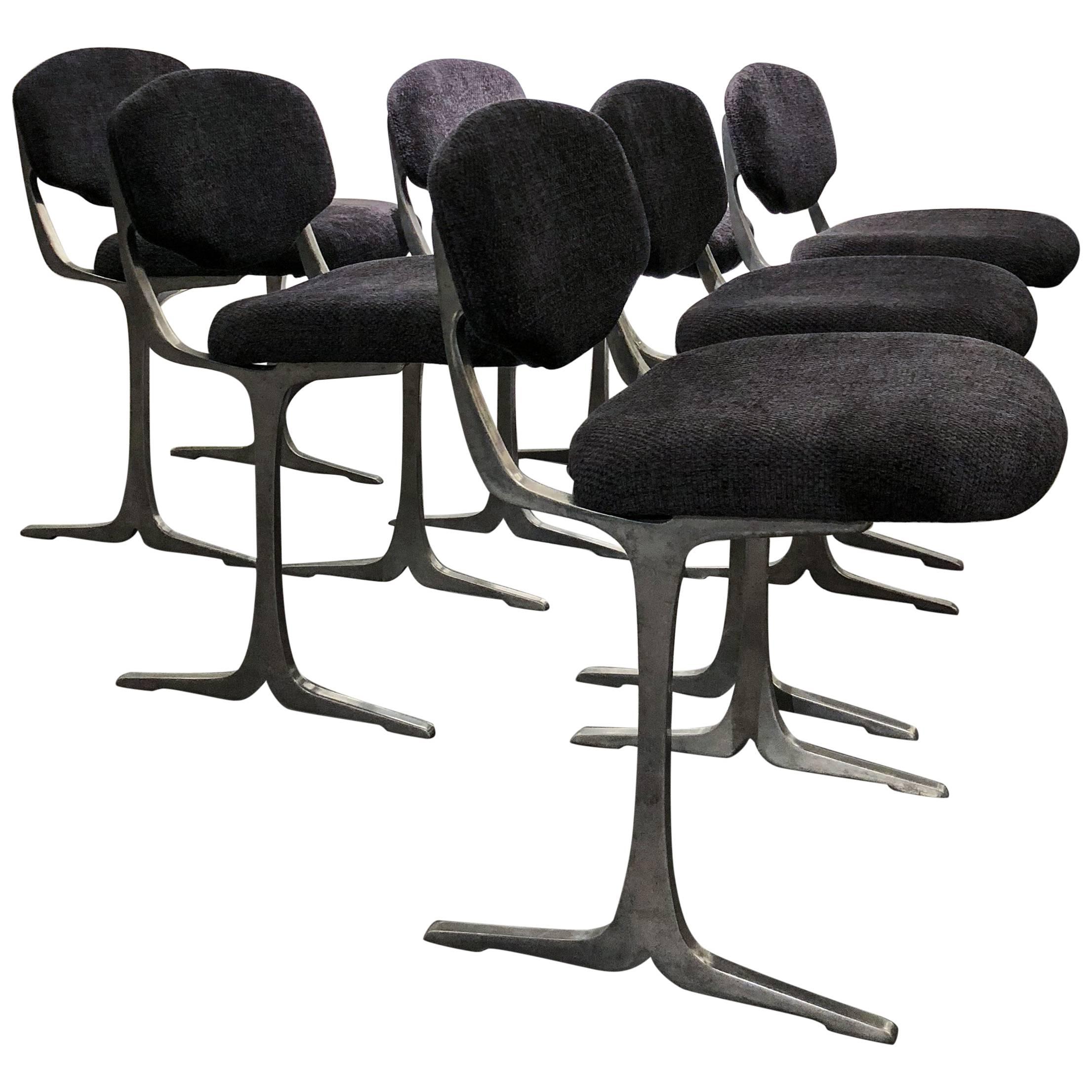 Six cast stainless steel chairs in the style of Pierre Folie, Francois Monnet, Michel Boyer.
New upholstery.