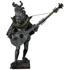 Figura di suonatore di liuto in bronzo dorato, XIX secolo