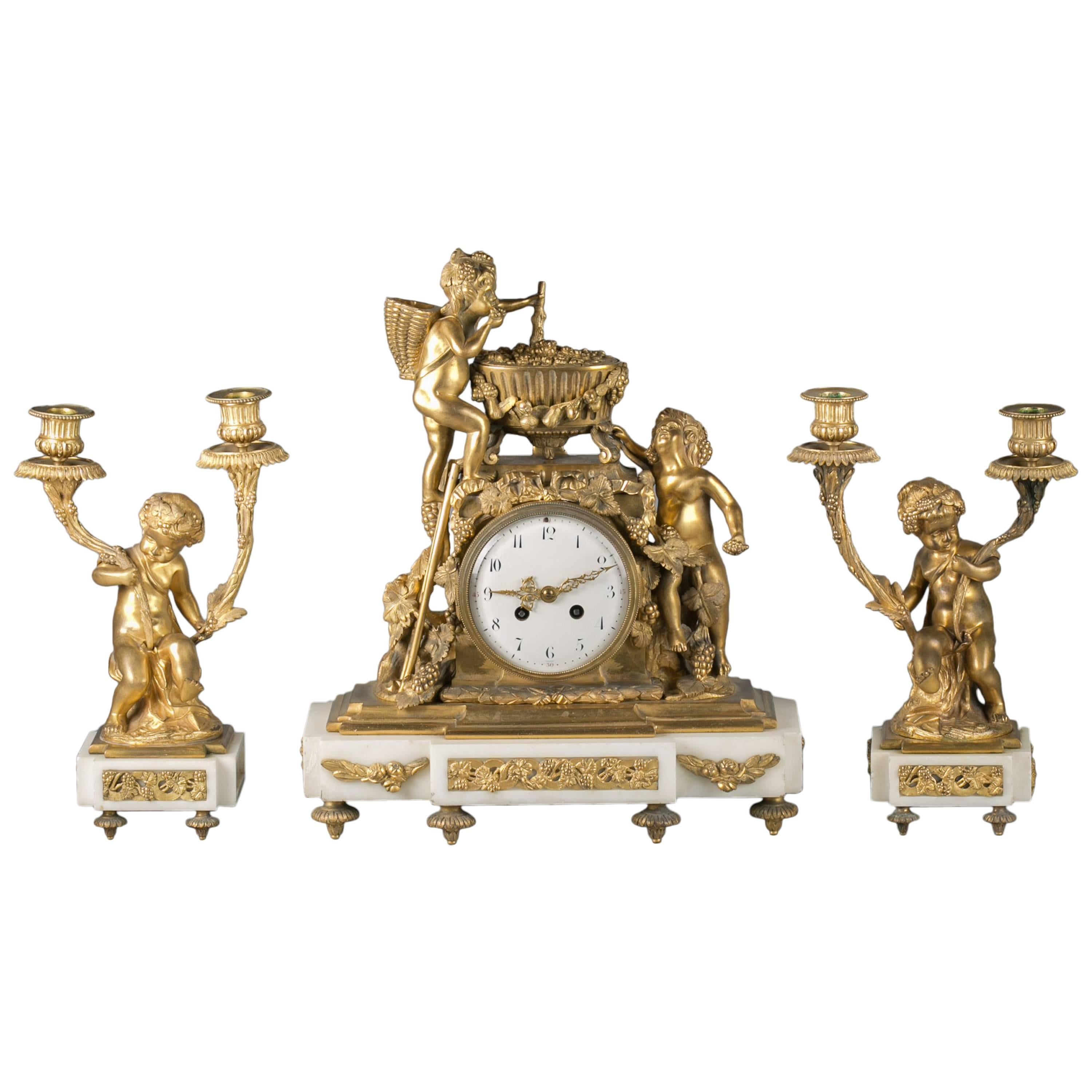 Three-Piece French Bronze and Marble Clock Garniture, circa 1875