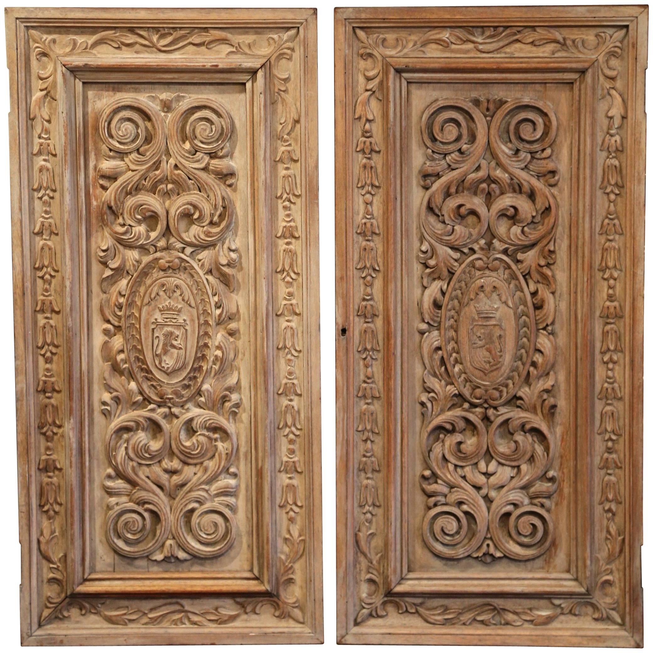Pair of 19th Century French Hand-Carved Walnut Panel Doors with Family Crests