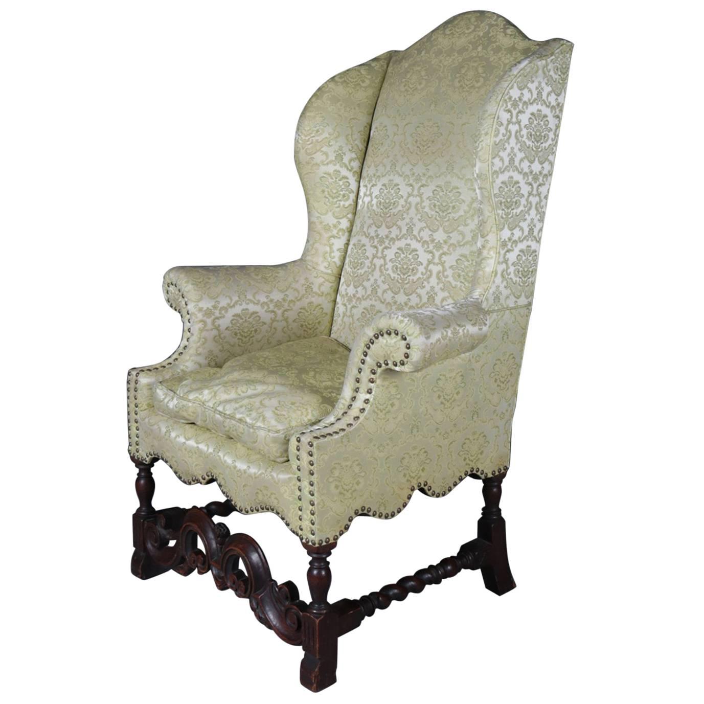 Antique English Edwardian Carved Mahogany Upholstered Wingback Chair, circa 1910