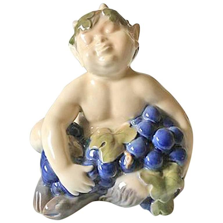 Royal Copenhagen Figurine Faun with Grapes #2361 For Sale