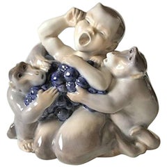 Royal Copenhagen Faun/Pan Figurine with Two Monkeys #2496