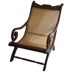 British Colonial, Ceylonese, Mahogany Rolled Arm Caned Steamers Chair