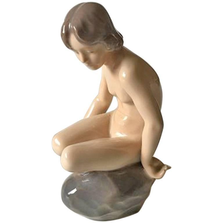 Royal Copenhagen Figurine Girl on Stone #4027 For Sale