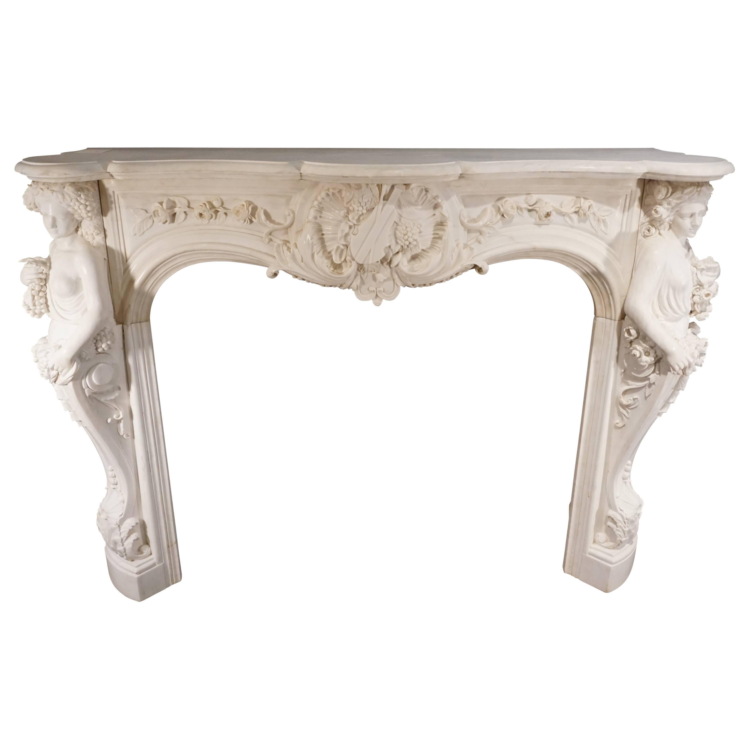 Heavily Carved Carrera Marble Mantel with Caryatids of Summer and Autumn