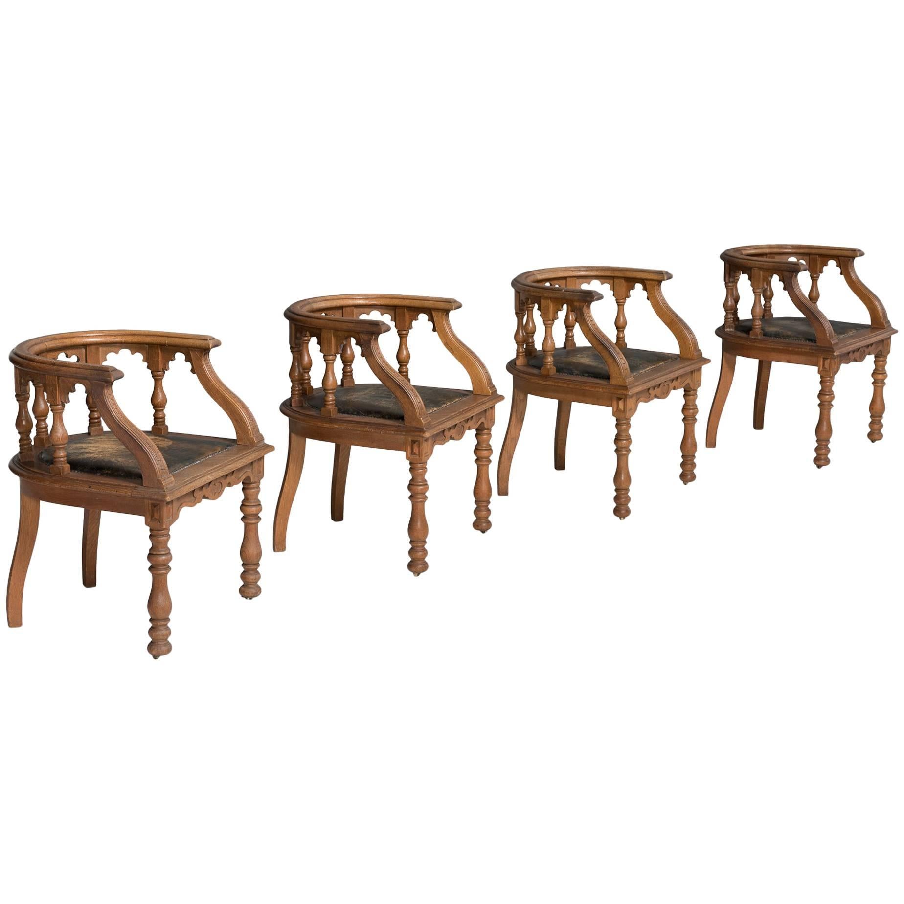 Taylor of Edinburgh oak armchair, Scotland, circa 1890.

Carved oak chairs with original leather upholstery, and inset brass castors. Made by John Taylor & Sons of Edinburgh.

Measures: 25